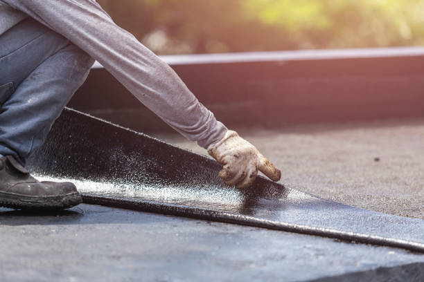 Professional Basement Waterproofing technician working in Stanton, AL